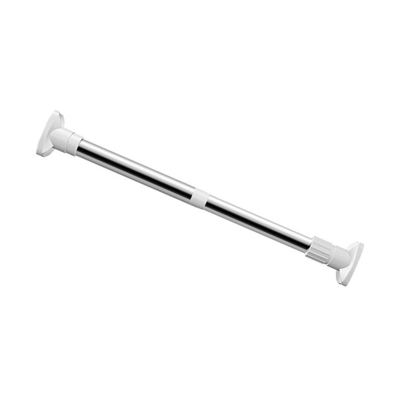 Lifestyle image showing the telescopic rod used in a laundry room for drying clothes