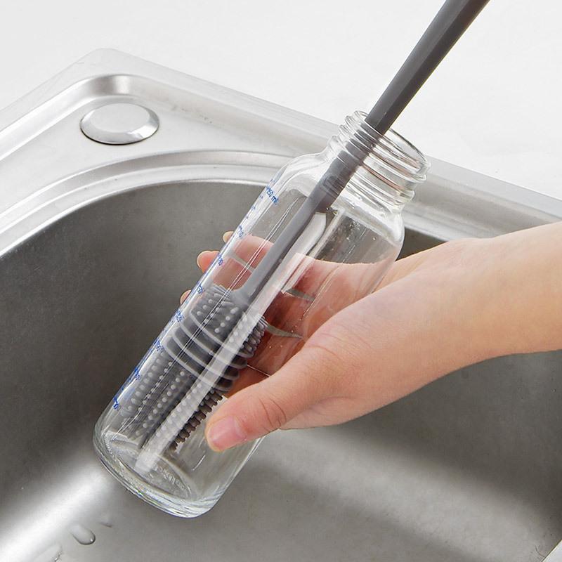 Durable cup and bottle brush for thorough kitchen cleaning, an essential household utensil