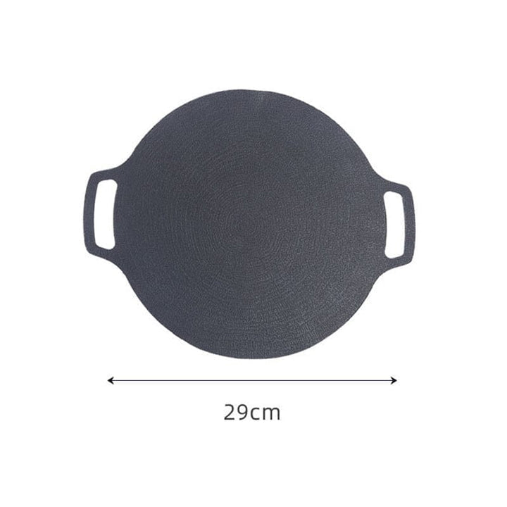 High-quality non-stick round grill pan, delivering even heat distribution for consistent results