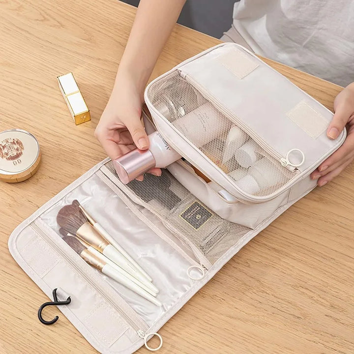 Hanging travel toiletry bag with sturdy hook, ideal for convenient bathroom & cosmetic organization.