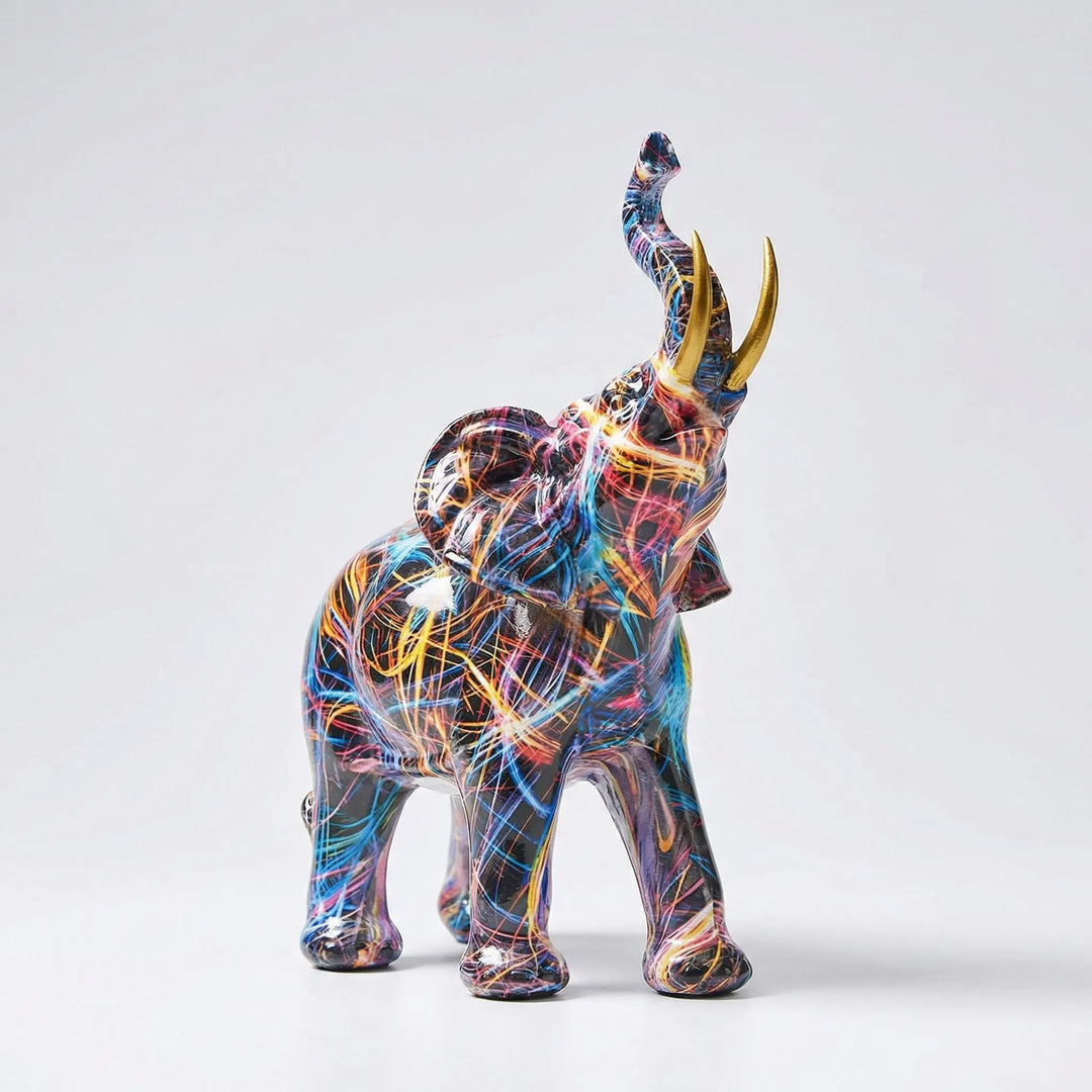 Modern abstract elephant sculpture for tabletops. Artistic colorful elephant decor, a vibrant home accent and unique gift.