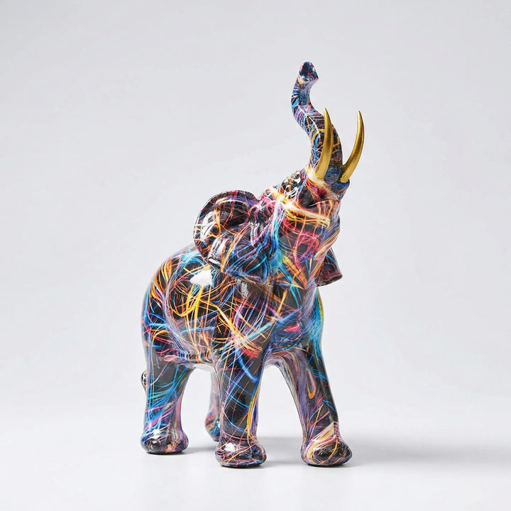 Modern abstract elephant sculpture for tabletops. Artistic colorful elephant decor, a vibrant home accent and unique gift.