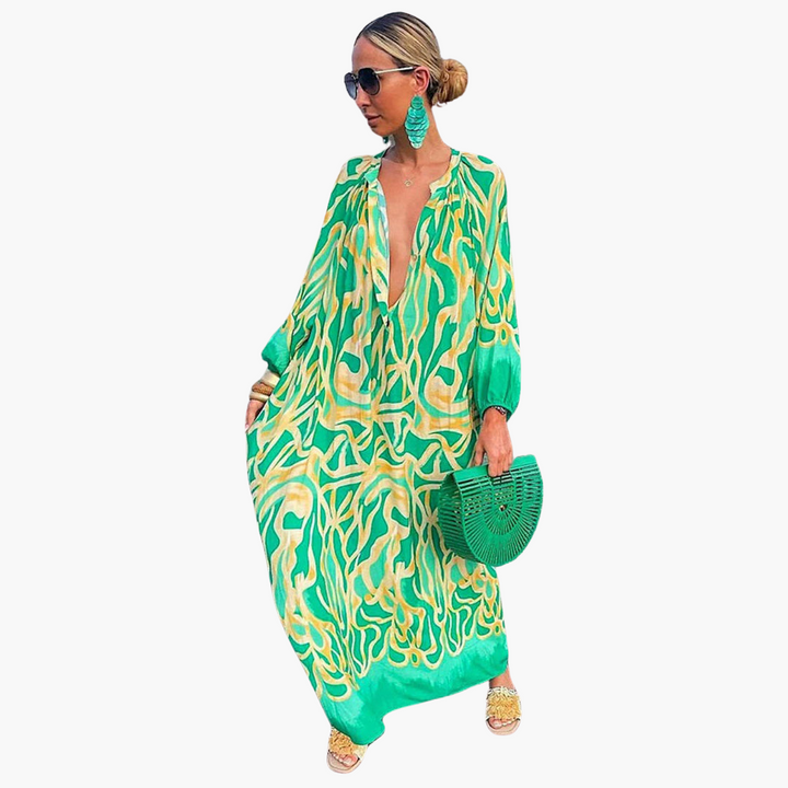 Vibrant abstract print V-neck oversized maxi dress, perfect for beach resort wear & summer vacation.