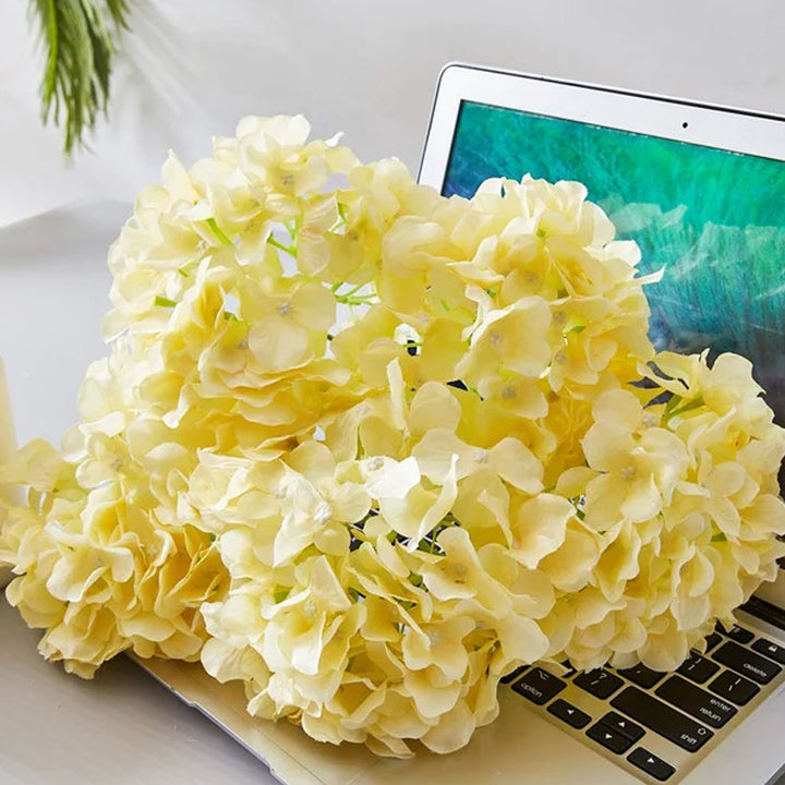 Artificial hydrangea flowers, meticulously crafted for a realistic look in home and outdoor decor.