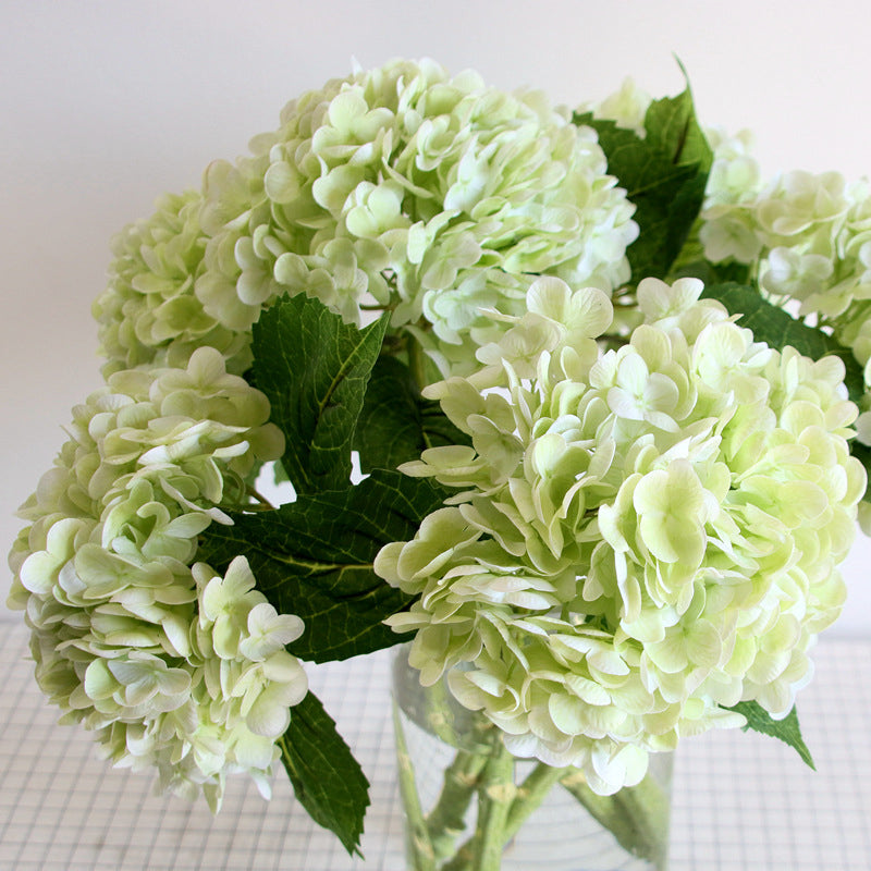 Lifelike artificial hydrangea flower arrangement, ideal for wedding decor or a maintenance-free floral display.