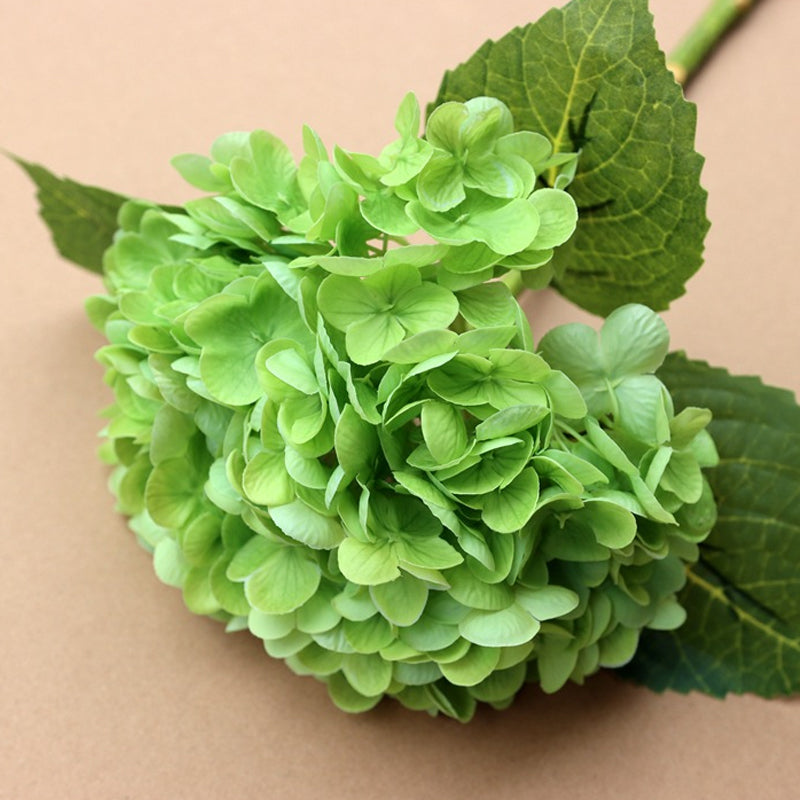 Artificial hydrangea flowers in full bloom, a charming and enduring floral arrangement for any room.