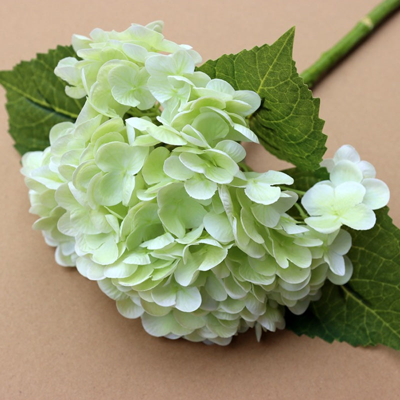 Artificial hydrangea plant with multiple stems, great for creating a full and lush floral arrangement.