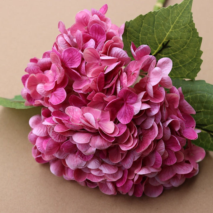 Vibrant artificial hydrangea bouquet, an excellent choice for a maintenance-free garden decoration.