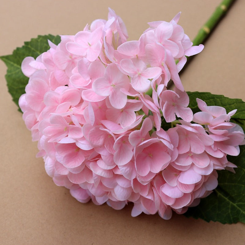 Artificial hydrangea flowers, perfect for adding a splash of color to outdoor decor or patios.