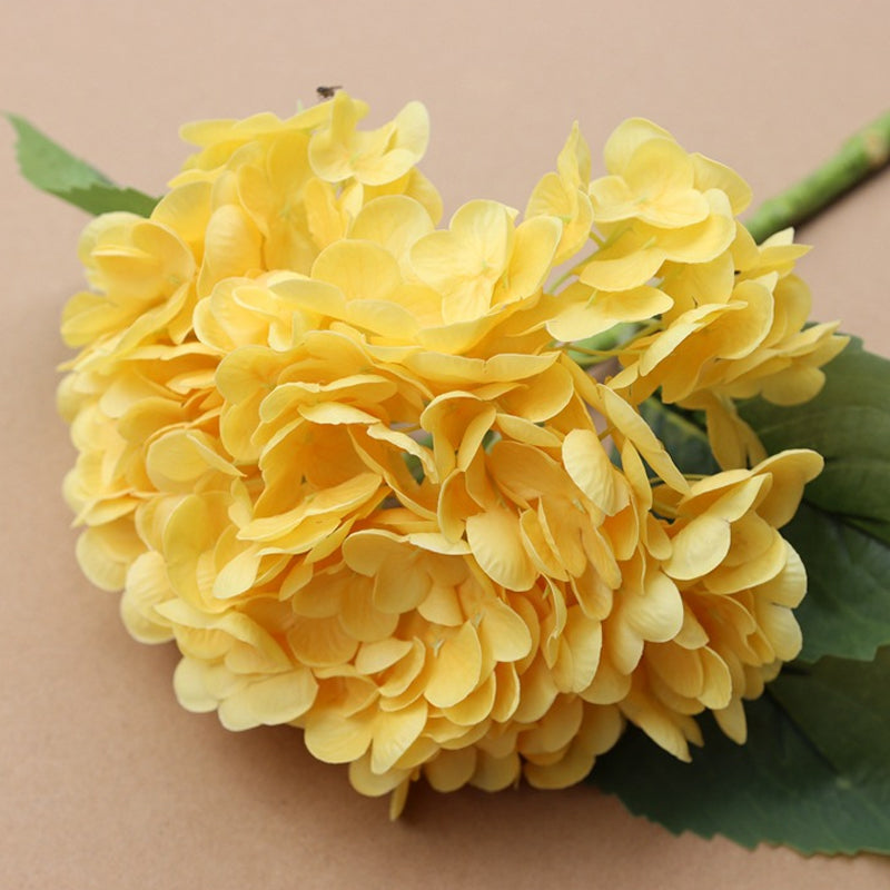 Elegant artificial hydrangea bouquet, offering a sophisticated and lasting floral arrangement option.