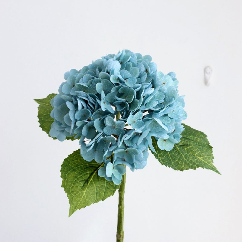 Artificial hydrangea bouquet with mixed colors, a beautiful fake plant for diverse home decor styles.