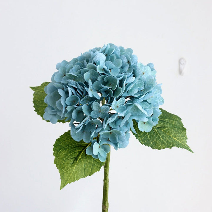 Artificial hydrangea bouquet with mixed colors, a beautiful fake plant for diverse home decor styles.