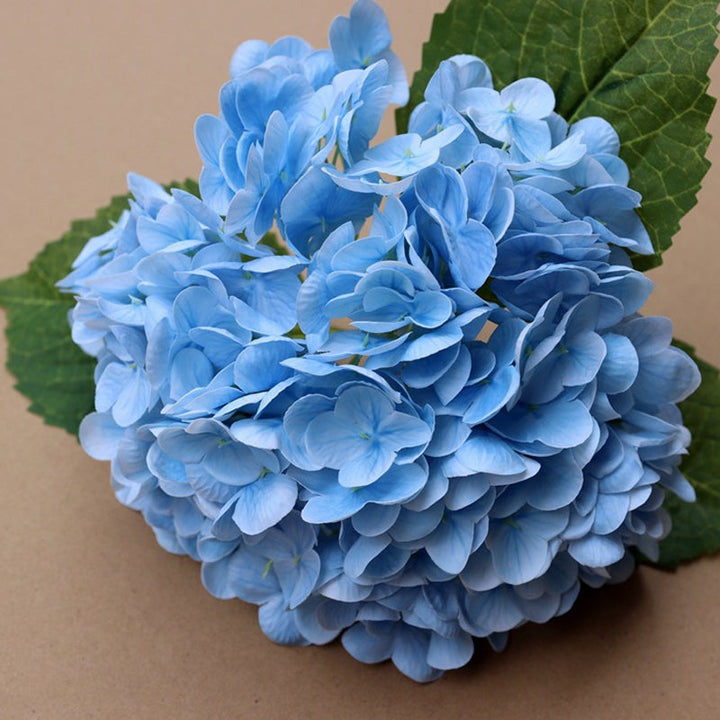 Artificial hydrangea blooms, capturing the essence of real flowers for maintenance-free decor.