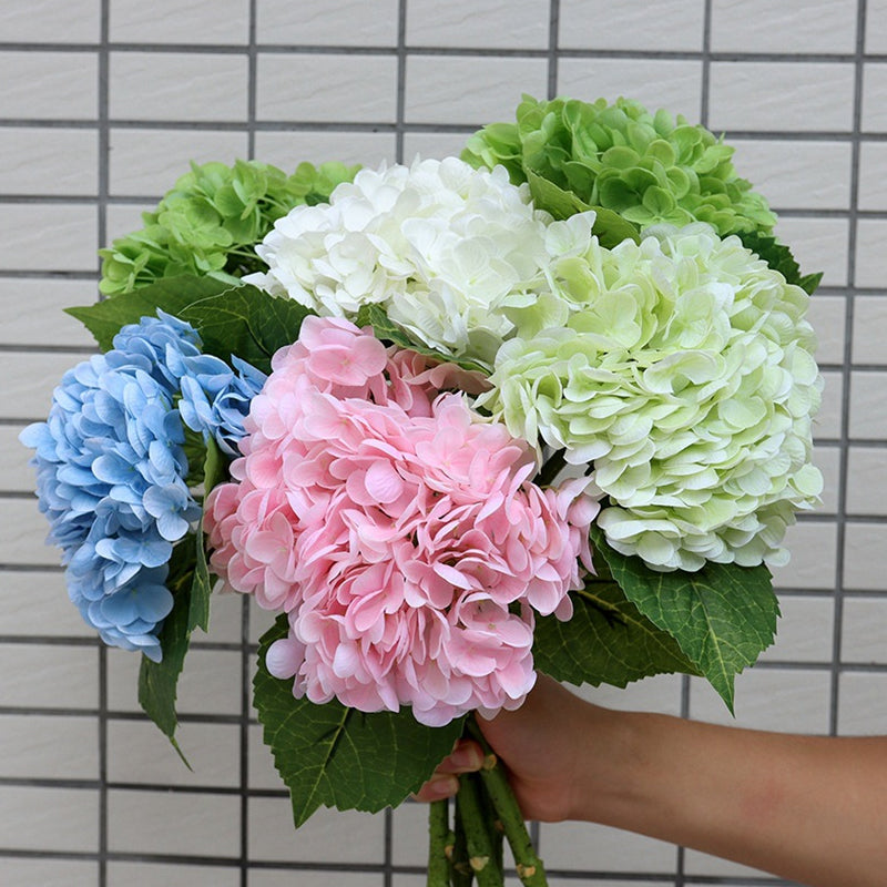 Bundle of colorful artificial hydrangea flowers, a beautiful and lasting addition to any home decor.