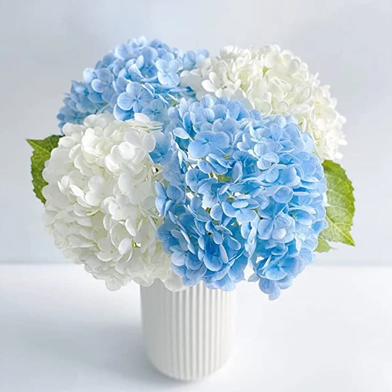 Bright pink artificial hydrangea flowers, a stunning floral arrangement for a pop of color in any room.