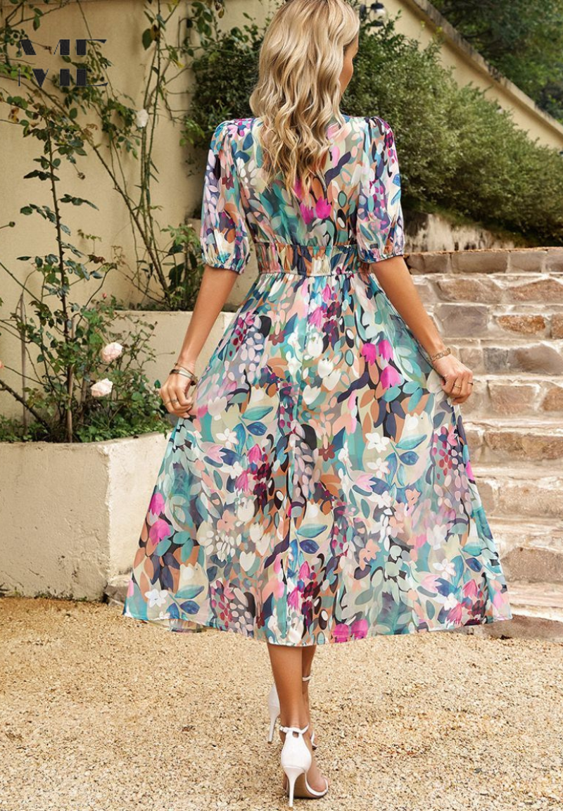 Elegant women's floral A-line midi dress with short sleeves, ideal for versatile summer styling.