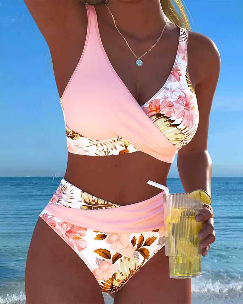 Vibrant floral print split bikini set for women, perfect for stylish beach and pool swimwear.