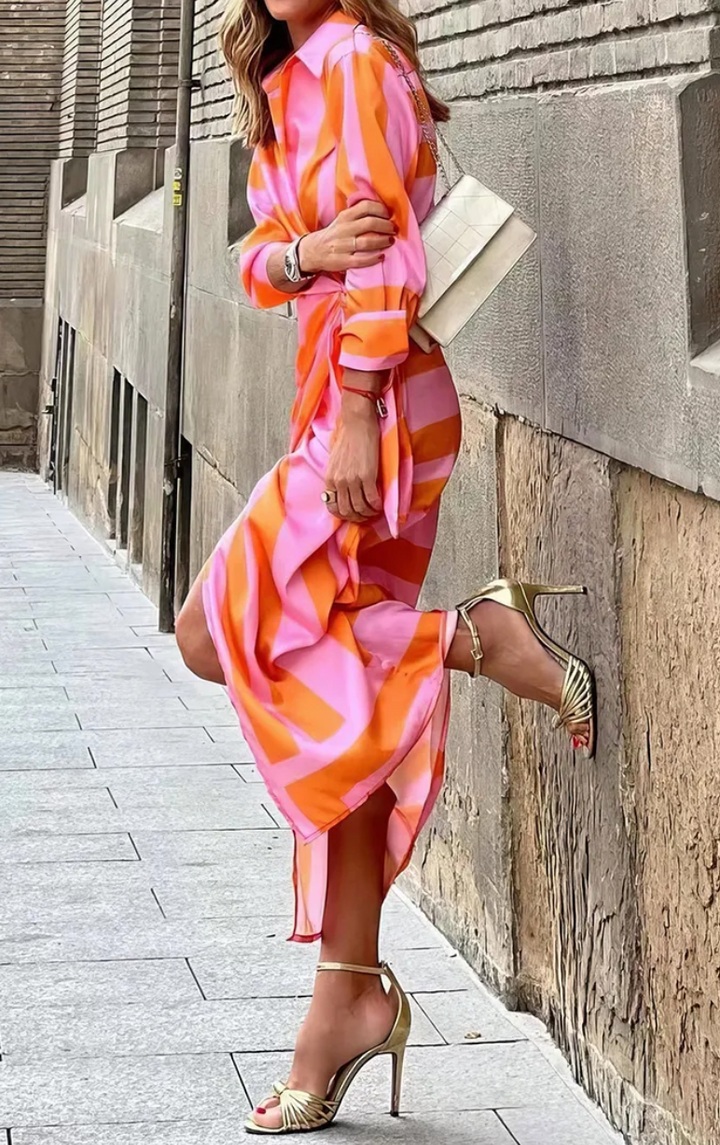 Versatile women's vibrant printed wrap dress, easily styled for casual days or elegant evening events.
