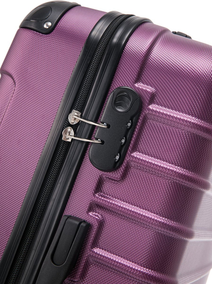 Practical purple 2-piece hardside luggage set, offering both carry-on and checked bag options.