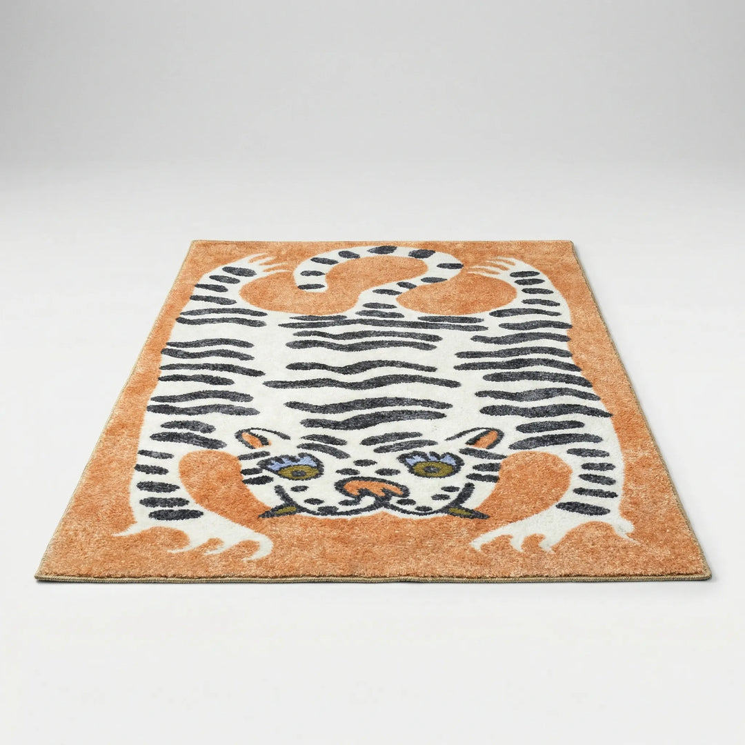 Washable tiger print area rug, ideal for kids' playrooms. Features a playful animal print design.