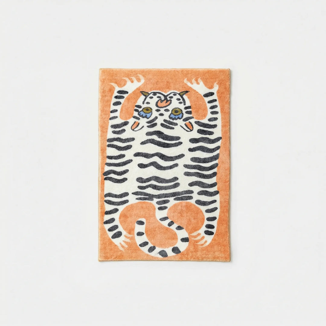 Eye-catching animal print area rug with tiger pattern, bringing vibrant style to an entryway.
