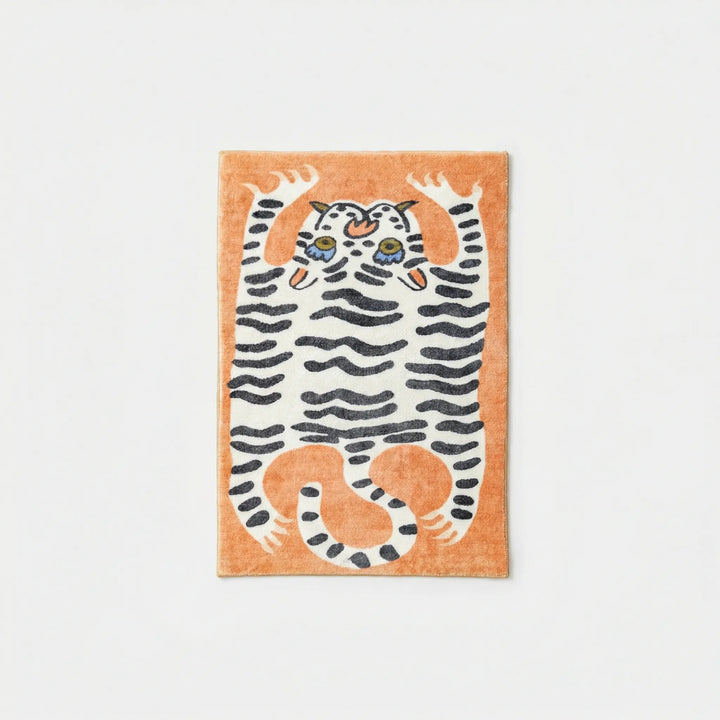 Eye-catching animal print area rug with tiger pattern, bringing vibrant style to an entryway.