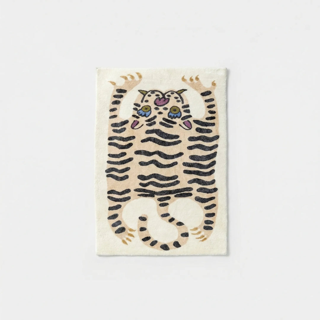 Flowique tiger print area rug with unique wavy pattern, suitable for living rooms or playrooms.