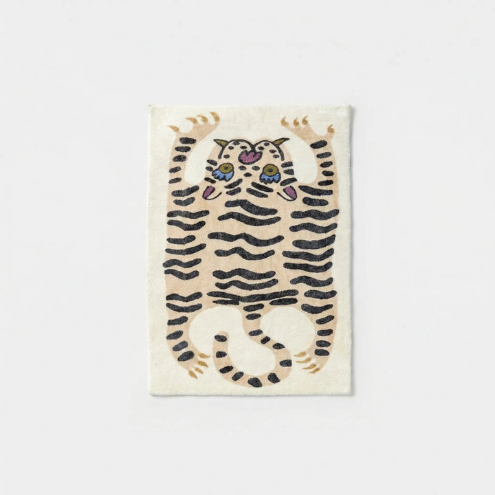 Flowique tiger print area rug with unique wavy pattern, suitable for living rooms or playrooms.