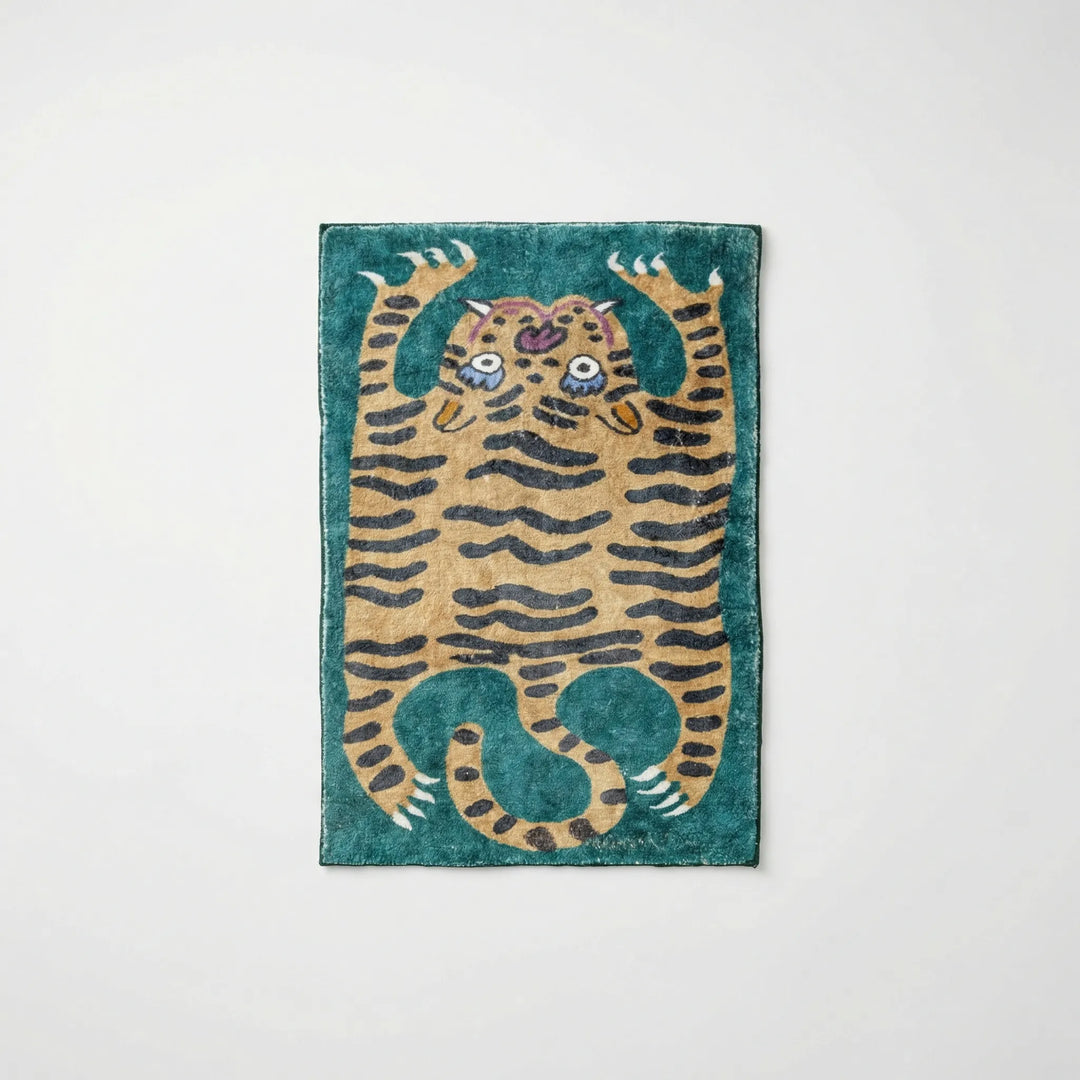 Decorative low pile tiger print area rug, perfect for adding a vibrant animal print to any space.