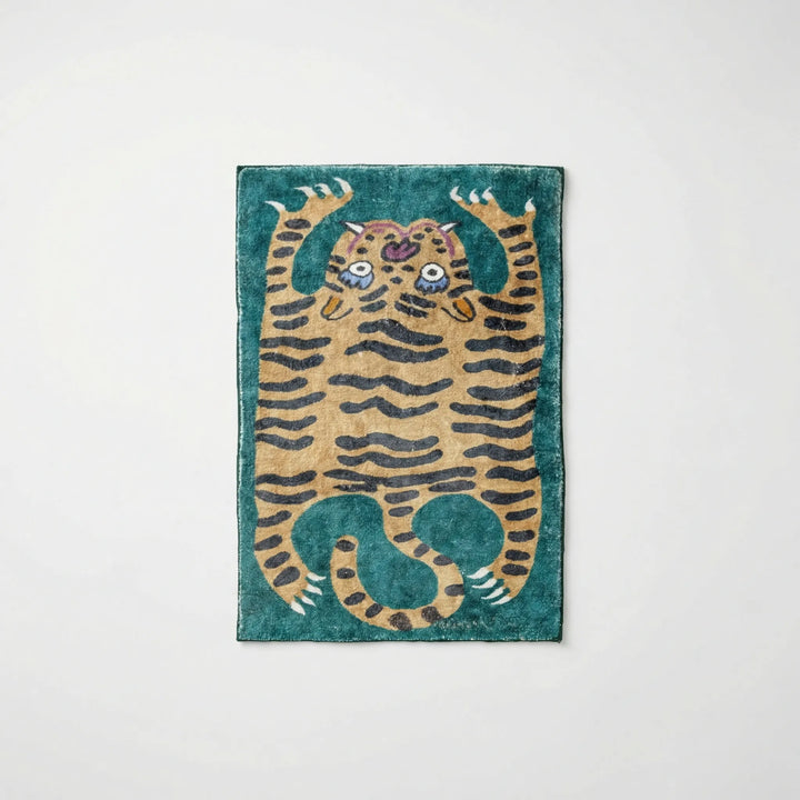 Decorative low pile tiger print area rug, perfect for adding a vibrant animal print to any space.