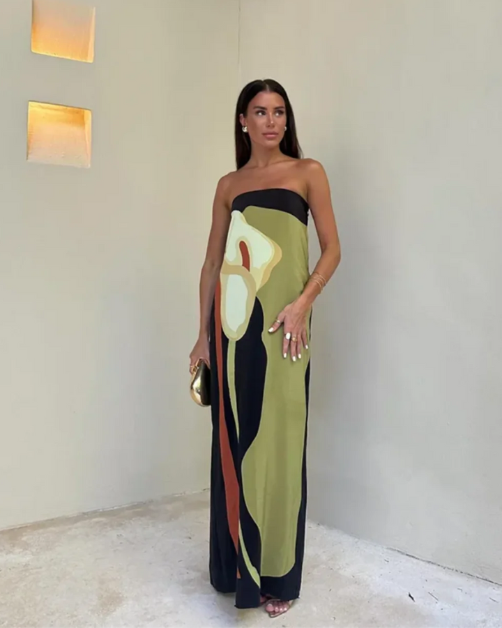 Vibrant women's flowing maxi dress, perfect for summer holidays and beach resort wear.