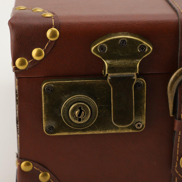 Authentic vintage brown leather travel case. Unisex luggage or decorative storage trunk with a reliable alloy lock.