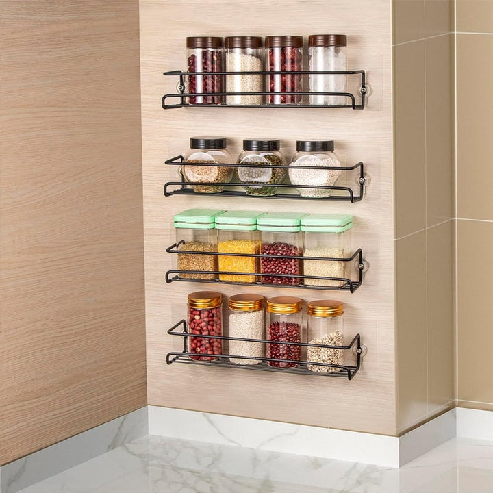 Kitchen wall-mounted spice rack, made of durable carbon steel, neatly organizing seasoning bottles.