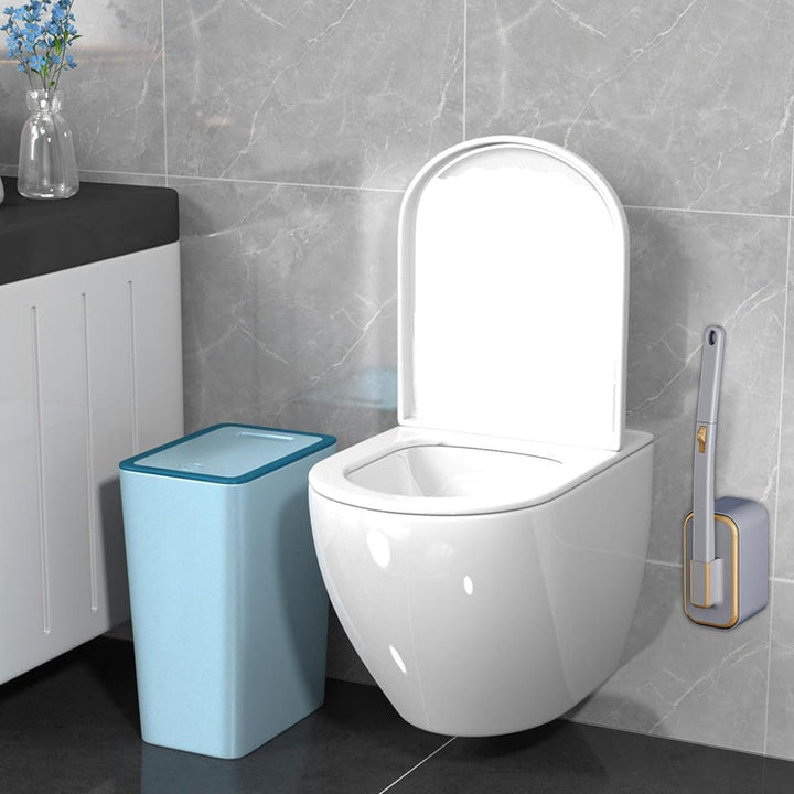 Convenient wall-mounted toilet brush with stack of disposable, ocean scented refills