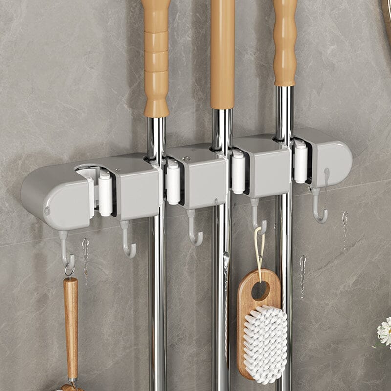 Multifunctional wall organizer rack securely holding mops, brooms & cleaning tools with hooks