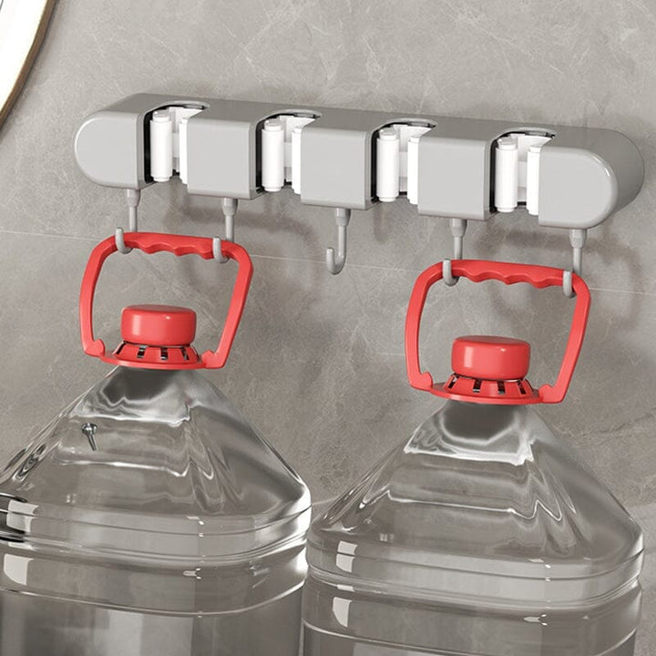 Space-saving mop and broom wall mount with hooks, perfect for home organization, black finish
