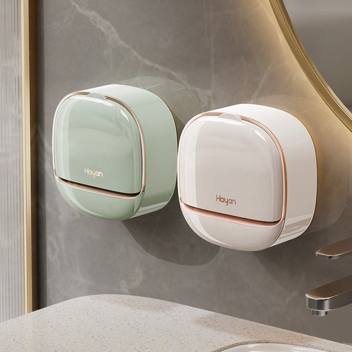 ABS plastic soap dish with strong adhesion, a wall-mounted solution for bathroom soap storage and drainage.