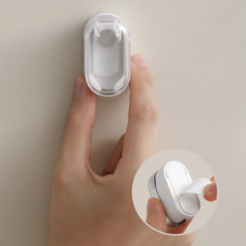 Close-up of wall mounted toothbrush holder with cover, showing dust protection
