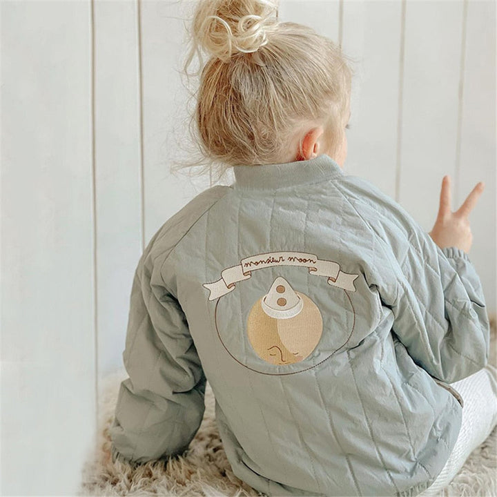 Colorful toddler winter coat, soft cotton-lined design for warmth & style. Essential kids' fashion for cold weather.