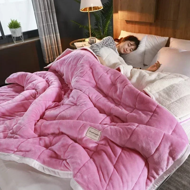 Warm flannel coral fleece throw blanket for cozy winter evenings. Soft, comfy homedecor.