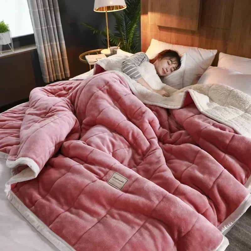 Stylish warm flannel coral fleece throw blanket. Elevates living room or bedroom decor with cozy comfort.