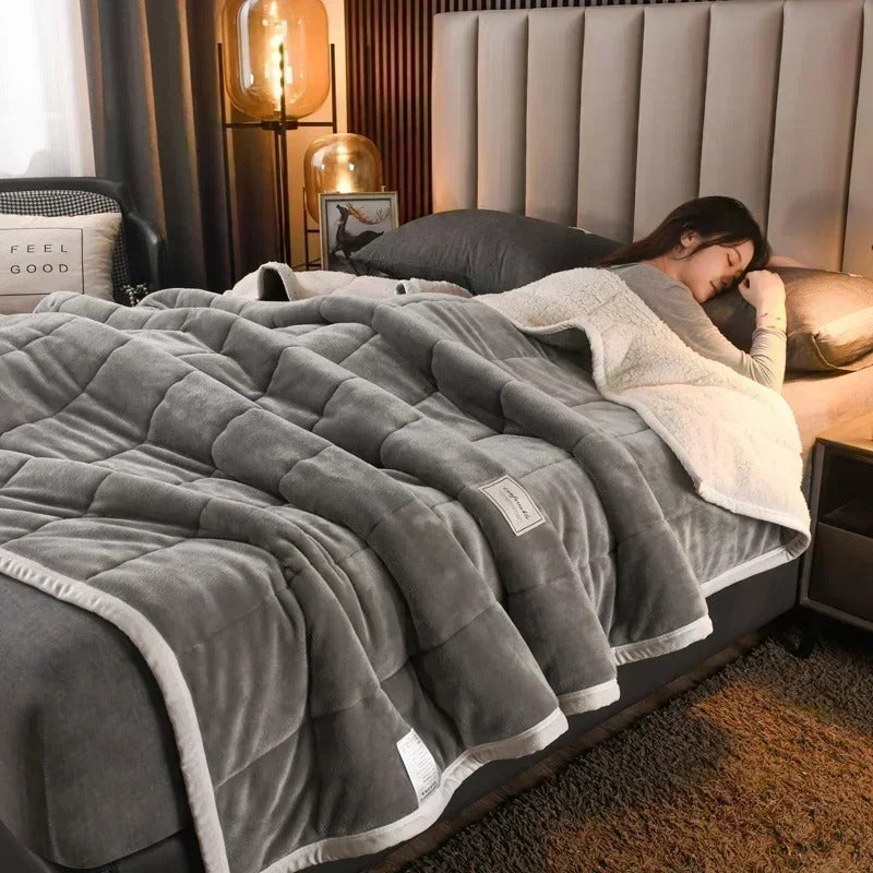 Luxurious warm flannel coral fleece blanket, perfect for a cozy night in during autumn and winter. Soft bedding.