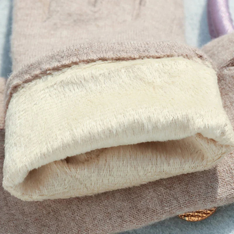 Pair of premium black cashmere blend touchscreen gloves for women, a must-have warm winter accessory.