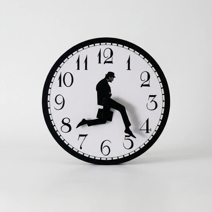 Stylish whimsical wall clock, a modern decorative accent for playful home decor. Easy to install, battery operated.