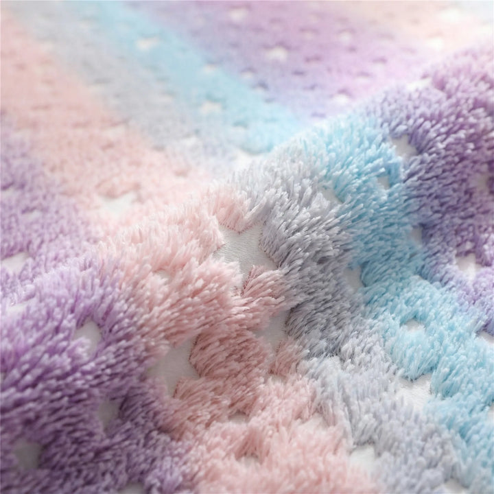 Flowique whimsical star pattern statement area rug, adding modern celestial charm to any room.