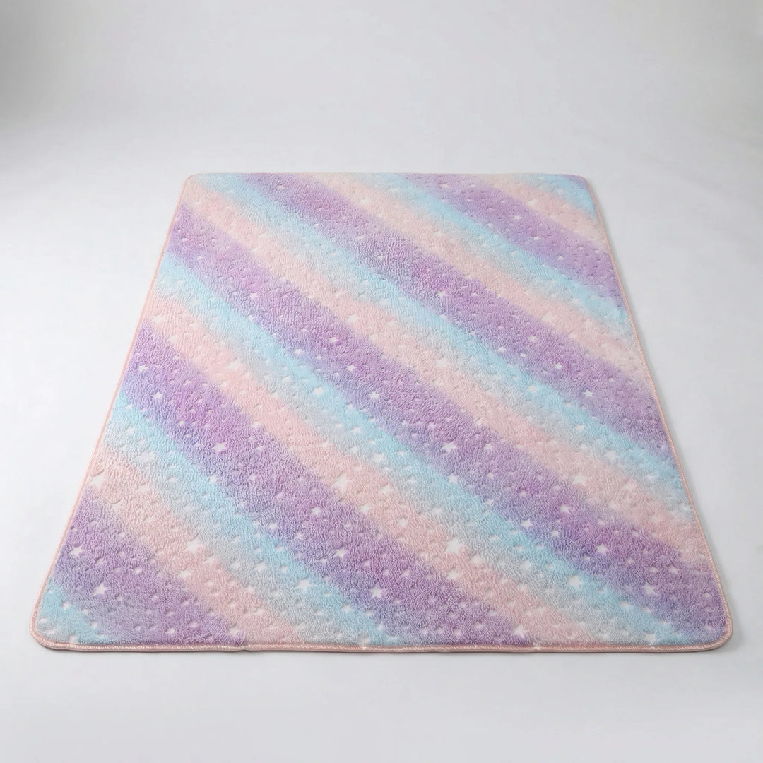 Soft, durable, easy-care star pattern area rug, ideal for a cozy bedroom or living space.