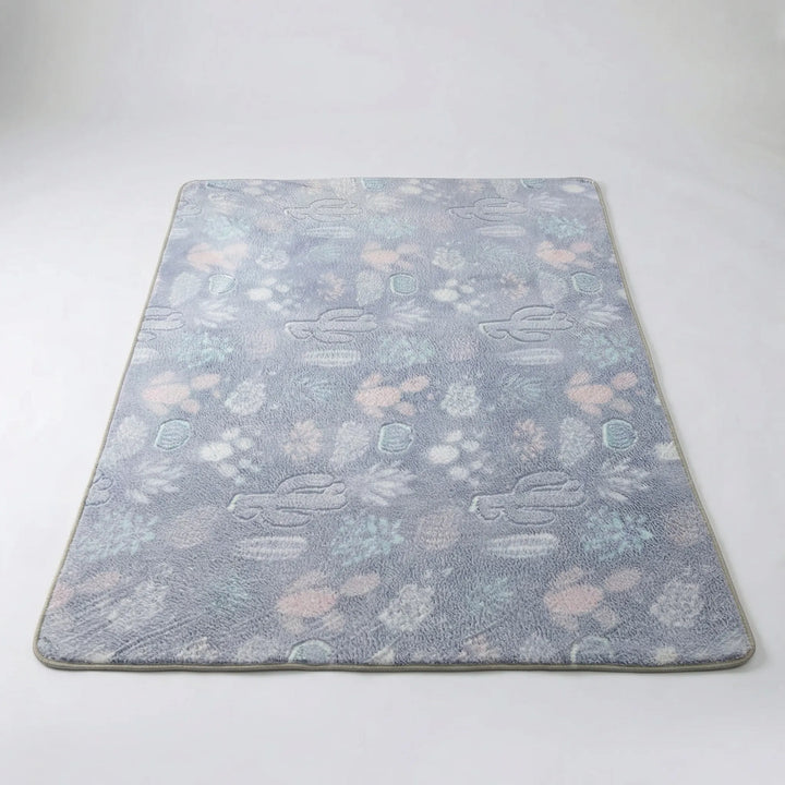 Modern statement area rug with a whimsical star pattern and wave design, perfect for home decor.