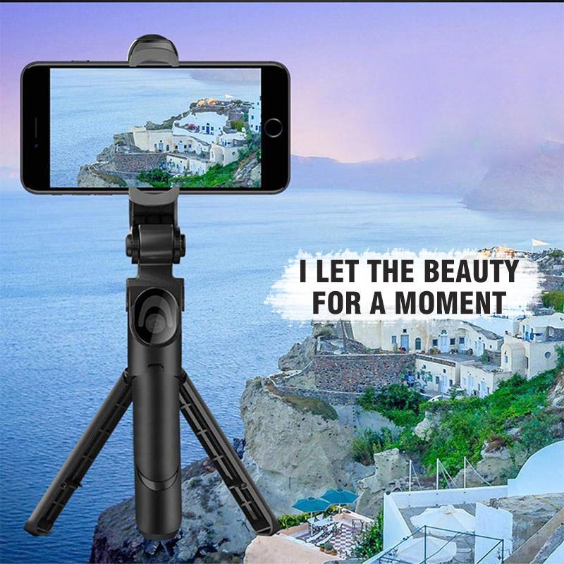 White 3-in-1 Bluetooth selfie stick tripod, extended, with smartphone connected for vlogging