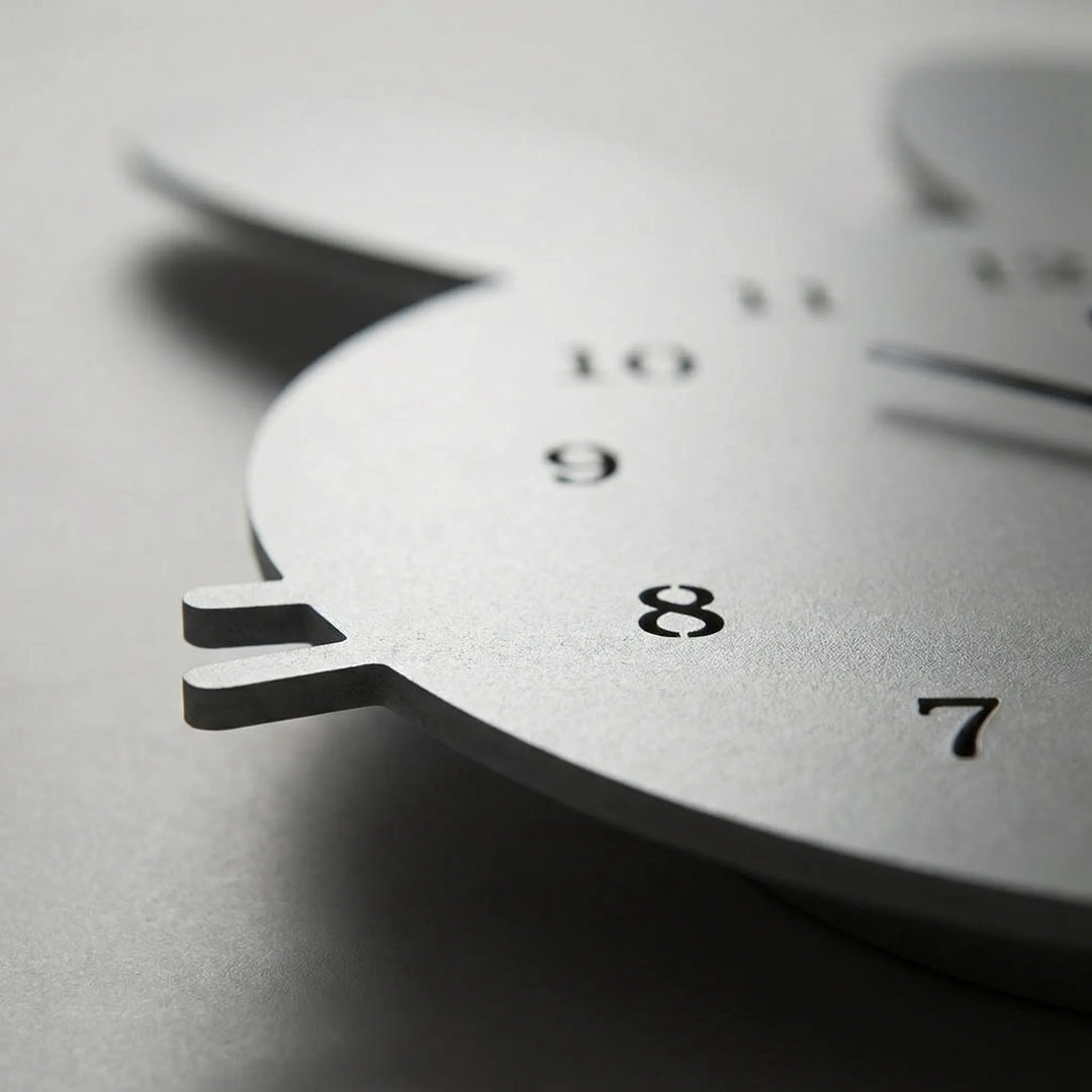 Cute bunny wall clock, silent & decorative. Ideal for a baby's nursery, kids room or playful home accent.