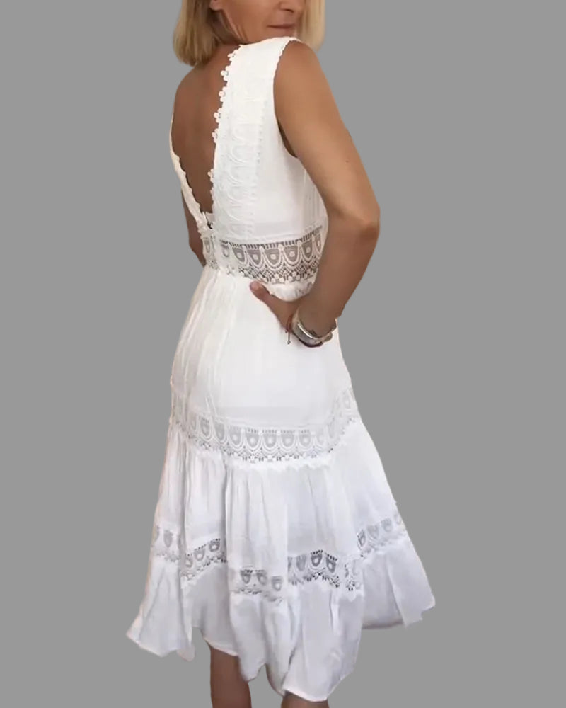 Bohemian white midi dress for women, a chic and relaxed fit summer dress ideal for casual outings or festivals.